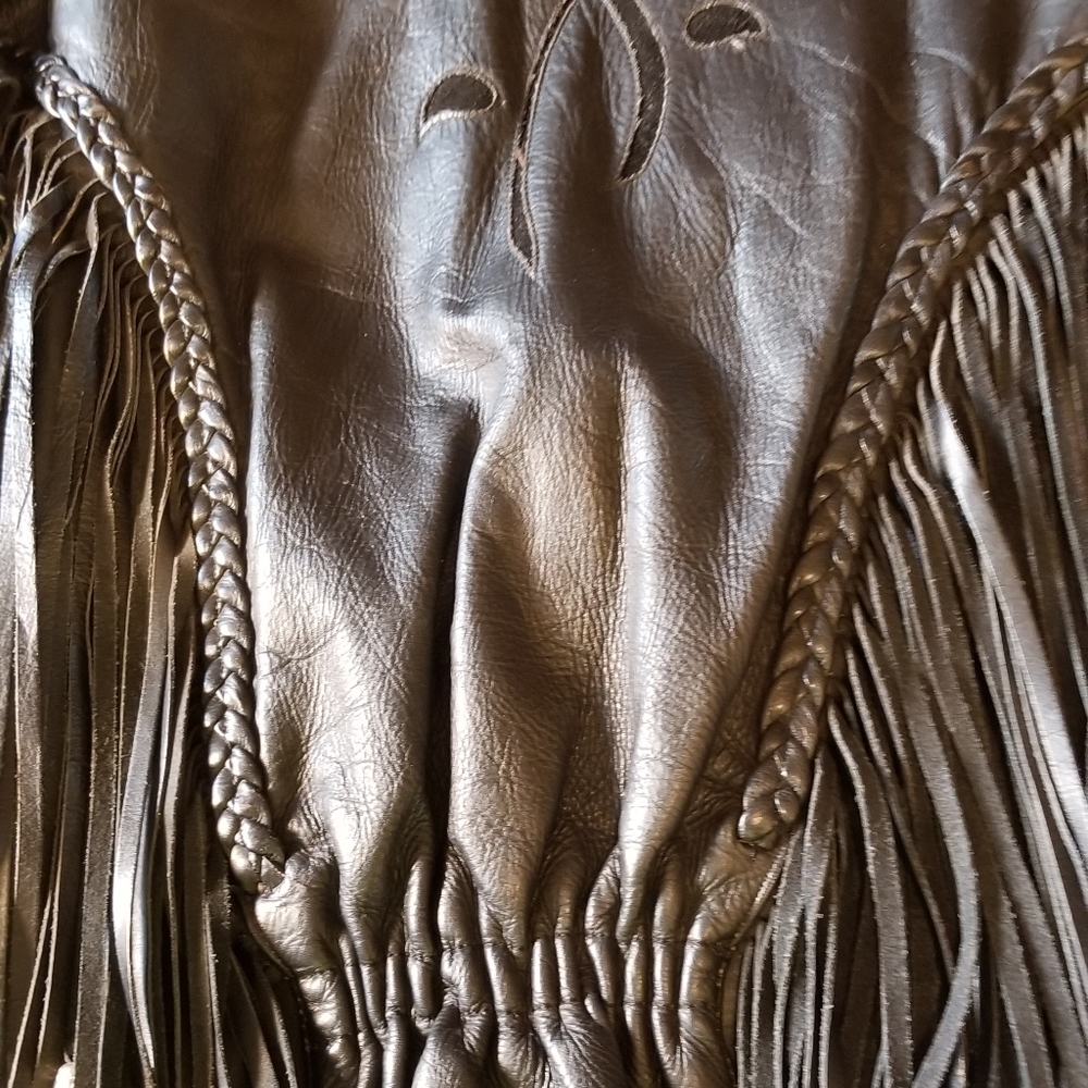Leather Jacket with Chaps and 3 Vests.